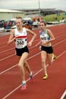 Rosie Johnson (Liverpool Pembroke) leads Amy Hinchly (Vale Royal AC) during the under-17s 1500 metres at the Northern Under-17s and 15s Championships, Liverpool.